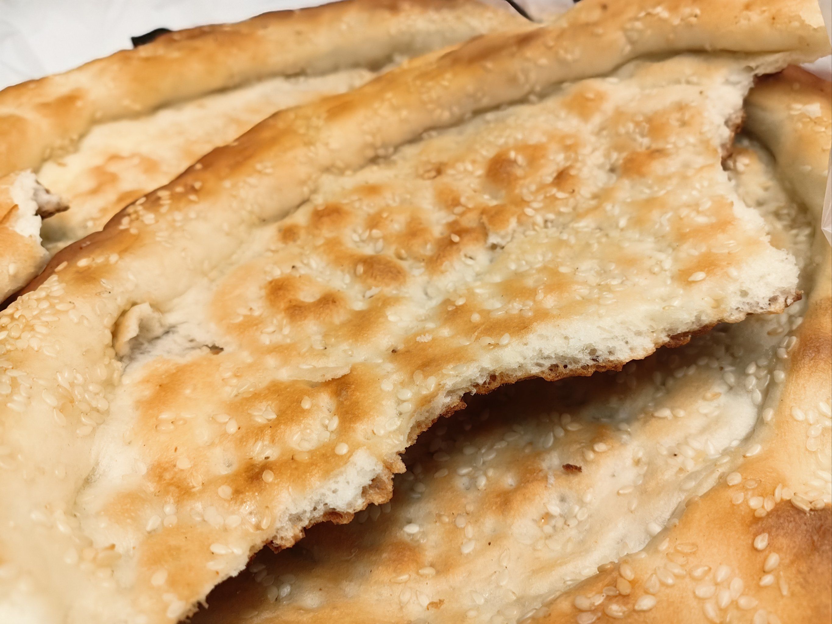 十月行记｜新疆打馕人：一场千年传统技艺与现代创意的对话